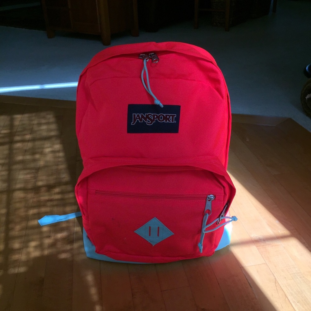 Jansport pink and blue extra storage backpack!!